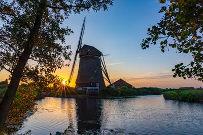 Photo during a beautiful sunset of an old windmill along the Kerkvaart near Hazerswoude Dorp, the Netherlands-small.jpg