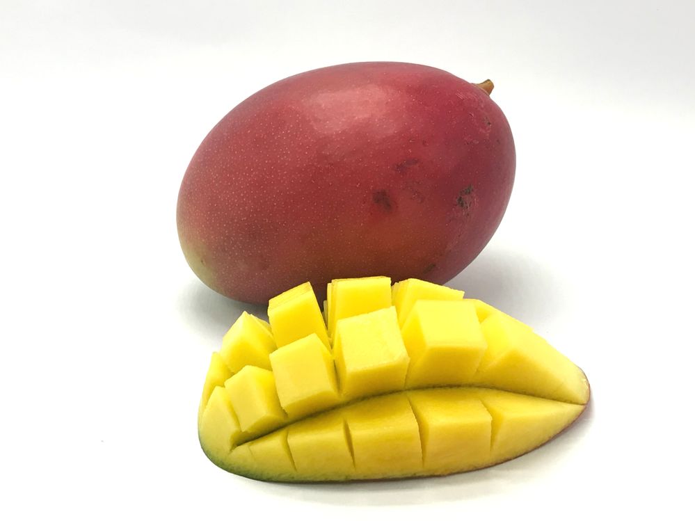 Mango from Brazil whole and an isolated slice.jpg