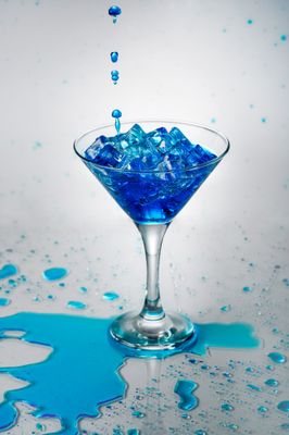 _Splashing in style- a blue colored drink in a conical glass with a splash stand.jpg