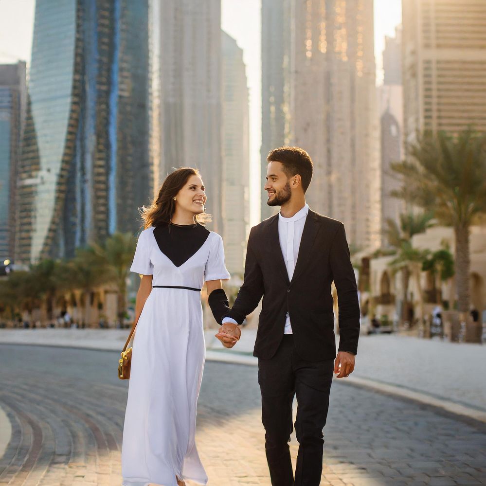 Firefly two young people in Dubai walking and holding hands, one woman, one man 43238.jpg