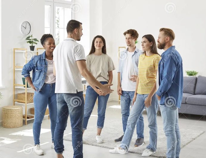 group of people standing having a discussion.png