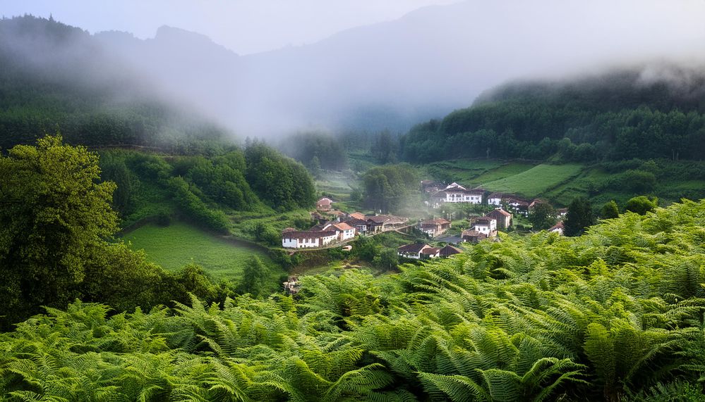 Firefly A quaint village nestled in a serene valley, wrapped in the soft embrace of morning fog. Den.jpg