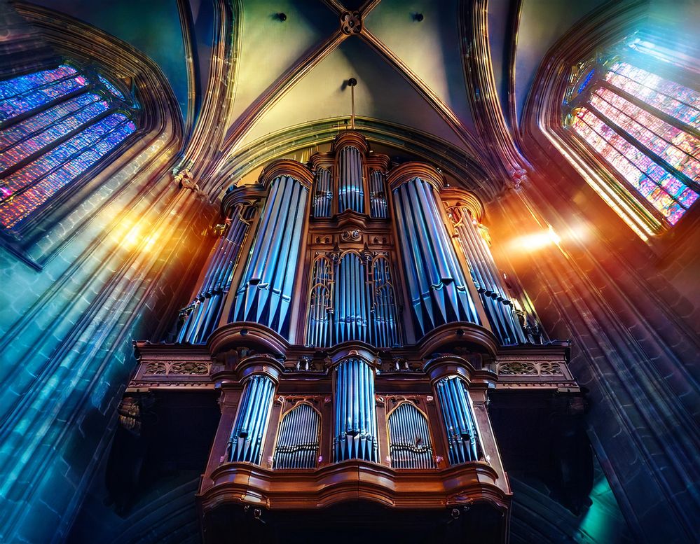 Firefly a grand organ in a gothic cathedral with pipes on every wall and lights shining through colo.jpg