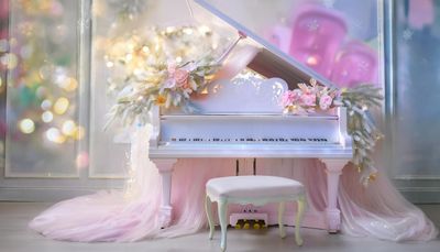 Firefly light pink baby piano on a white background with colored lights shining softly in the backgr.jpg