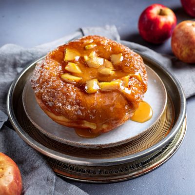 Firefly a delicious large apple fritter with extra glaze to make the appearance more shiny show tin.jpg