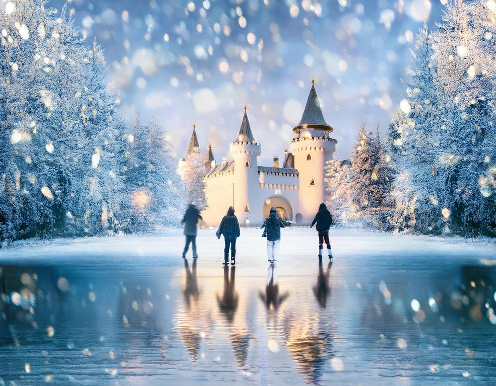 Firefly Ice skaters on frozen pond surrounded by icy trees. Ice castle in background. Snow falling. .jpg