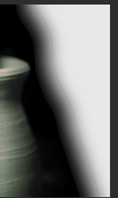 Final result shows hard edge to the left of the feather.